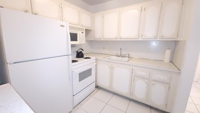 REDUCED TO SELL! Discover easy coastal living in this charming - photo 7
