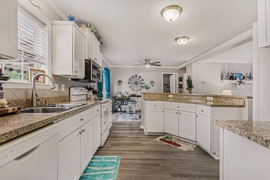 Welcome to this beautifully maintained 3-bedroom, 2-bathroom - photo 9