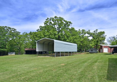 32 acres,3 Homes, 4 Septics,Carports, RVShop, Barns & PrivateLake - photo 8