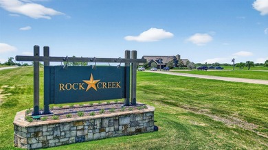 Build your dream home on this premier lot in Rock Creek, home to - photo 2