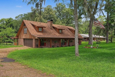 Tucked away on 1.21 acres along the canal side of beautiful Lake - photo 3