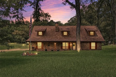 Tucked away on 1.21 acres along the canal side of beautiful Lake - photo 4