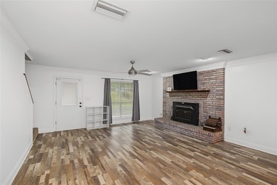 Tucked away on 1.21 acres along the canal side of beautiful Lake - photo 6