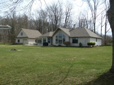 MARBLE LAKE 4BR, 2.5 bath, 2 lots, 250ft. of lake frontage. SOLD - Lake Home SOLD! in Quincy, Michigan