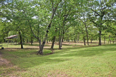 32 acres,3 Homes, 4 Septics,Carports, RVShop, Barns & PrivateLake - photo 5