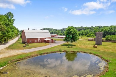 Step into a world of opportunity with this historical log home w - photo 2