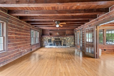 Step into a world of opportunity with this historical log home w - photo 5