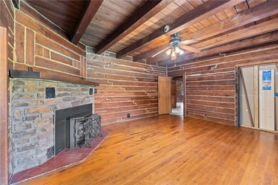 Step into a world of opportunity with this historical log home w - photo 6