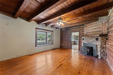 Step into a world of opportunity with this historical log home w - photo 7