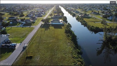 Discover the perfect intersection canal-front lot with expansive - photo 2