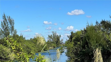 Discover the perfect intersection canal-front lot with expansive - photo 6