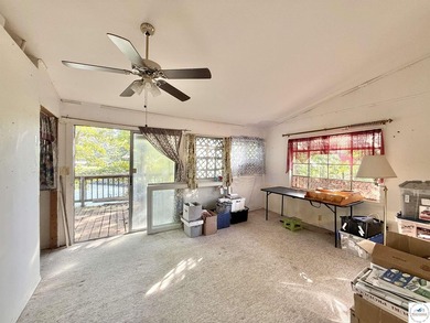 Discover the potential of this quaint two-bedroom cabin, nestled - photo 12