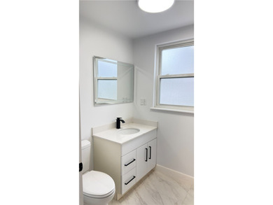 A fully reimagined four-bed, three-and-a-half-bath home blending - photo 12