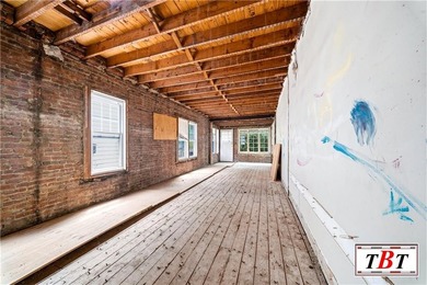 Welcome to 1073 East 3rd Street, a one family brick home sitting - photo 13