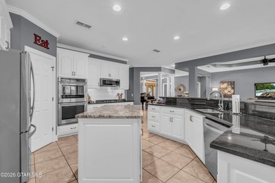 Nestled on approximately 1.5 beautifully landscaped acres in the - photo 13