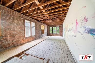 Welcome to 1073 East 3rd Street, a one family brick home sitting - photo 21