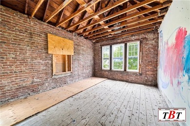 Welcome to 1073 East 3rd Street, a one family brick home sitting - photo 22