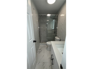 A fully reimagined four-bed, three-and-a-half-bath home blending - photo 23