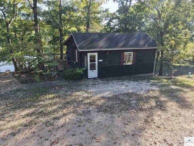 Discover the potential of this quaint two-bedroom cabin, nestled - photo 28