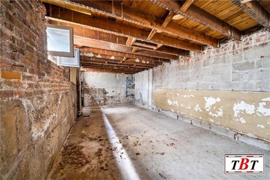 Welcome to 1073 East 3rd Street, a one family brick home sitting - photo 29