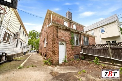 Welcome to 1073 East 3rd Street, a one family brick home sitting - photo 33