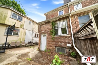 Welcome to 1073 East 3rd Street, a one family brick home sitting - photo 34