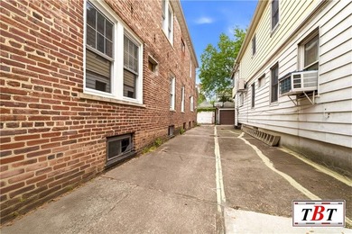 Welcome to 1073 East 3rd Street, a one family brick home sitting - photo 36