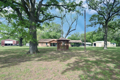 32 acres,3 Homes, 4 Septics,Carports, RVShop, Barns & PrivateLake - photo 22