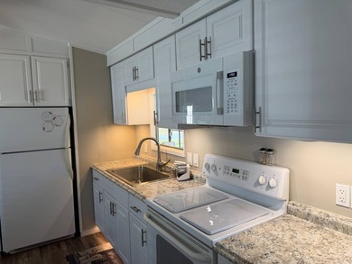 MOVE IN READY. Beautifully furnished home with all new subfloor - photo 9