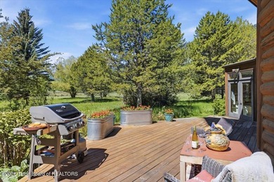 Set on three private acres along Fish Creek Road in Wilson, this - photo 12