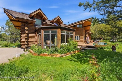 Set on three private acres along Fish Creek Road in Wilson, this - photo 13