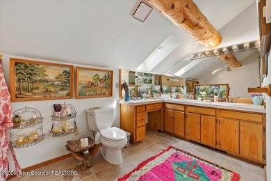 Set on three private acres along Fish Creek Road in Wilson, this - photo 29