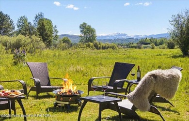 Set on three private acres along Fish Creek Road in Wilson, this - photo 34