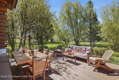 Set on three private acres along Fish Creek Road in Wilson, this - photo 35