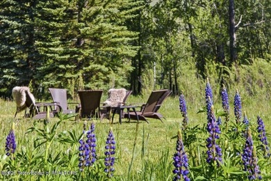 Set on three private acres along Fish Creek Road in Wilson, this - photo 41