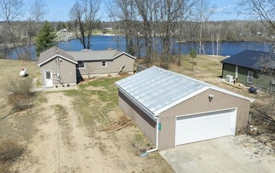 (private lake, pond, creek) Home Active Under Contract in White Cloud Michigan