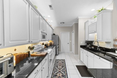 Welcome to 119 Ashworth Drive, a beautifully updated 3-bedroom - photo 6