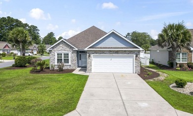 Welcome to this beautifully maintained single-level home in the - photo 1
