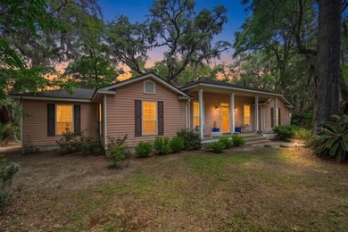Charming island home w/ stunning marsh views! Nestled among the - photo 1