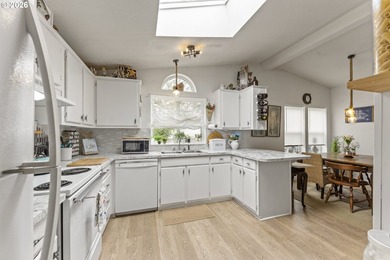 Don't let the drive-by fool you-this light and bright home is a - photo 11