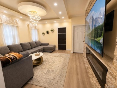 Spacious 2-family home featuring 3 bedrooms on each floor, a - photo 2