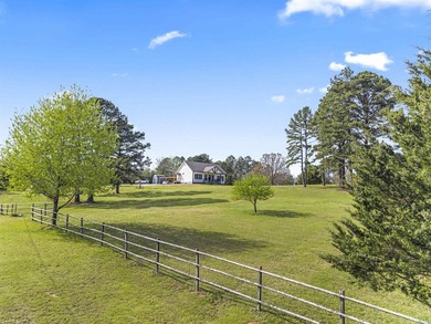 Check out this 20-acre equestrian estate! The property features - photo 27