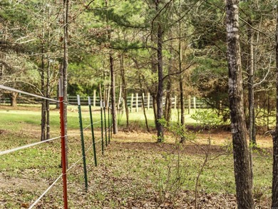 Check out this 20-acre equestrian estate! The property features - photo 31