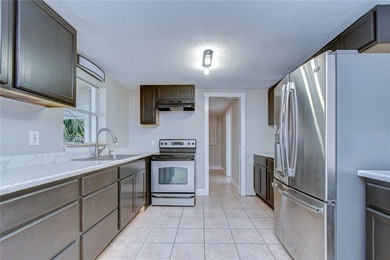 Move-in ready and beautifully updated, this freshly renovated - photo 7