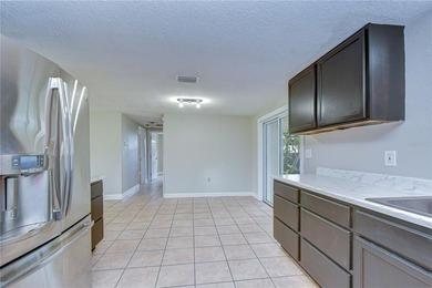 Move-in ready and beautifully updated, this freshly renovated - photo 8