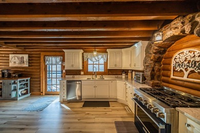 The spacious, one of a kind log cabin home is wonderfully - photo 33