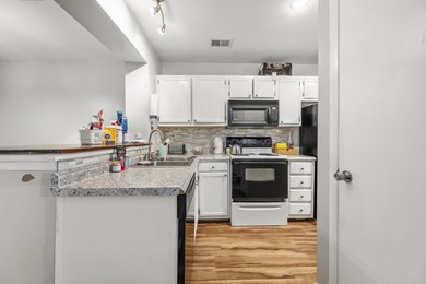 Welcome to this spacious and charming two-story, second-floor - photo 5