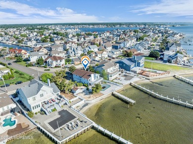 Start your summer 2026 in this prime bay front bi-level nestled - photo 5