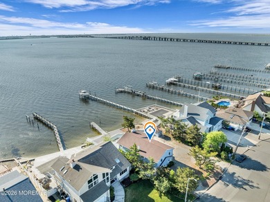 Start your summer 2026 in this prime bay front bi-level nestled - photo 6