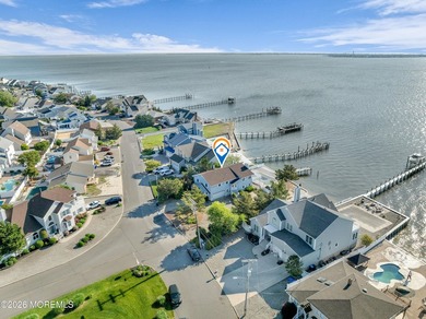 Start your summer 2026 in this prime bay front bi-level nestled - photo 8